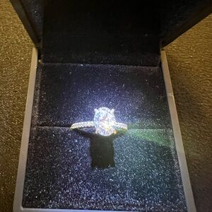 Dazzling white gold Mossianite and Diamond engagement ring.